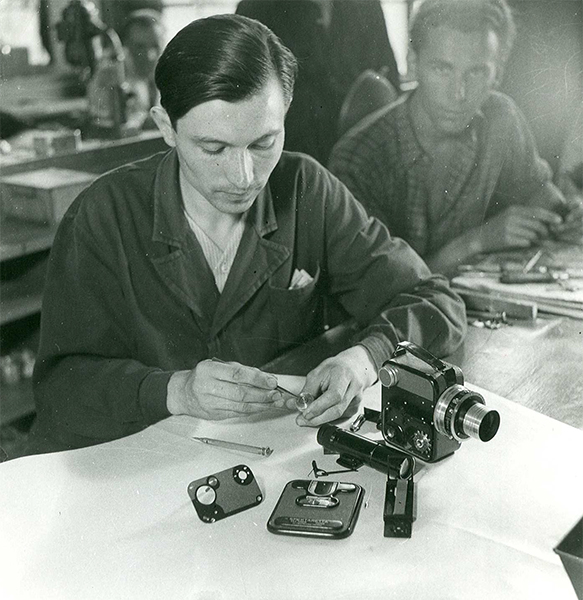 Factory Workers and Partially Assembled Camera